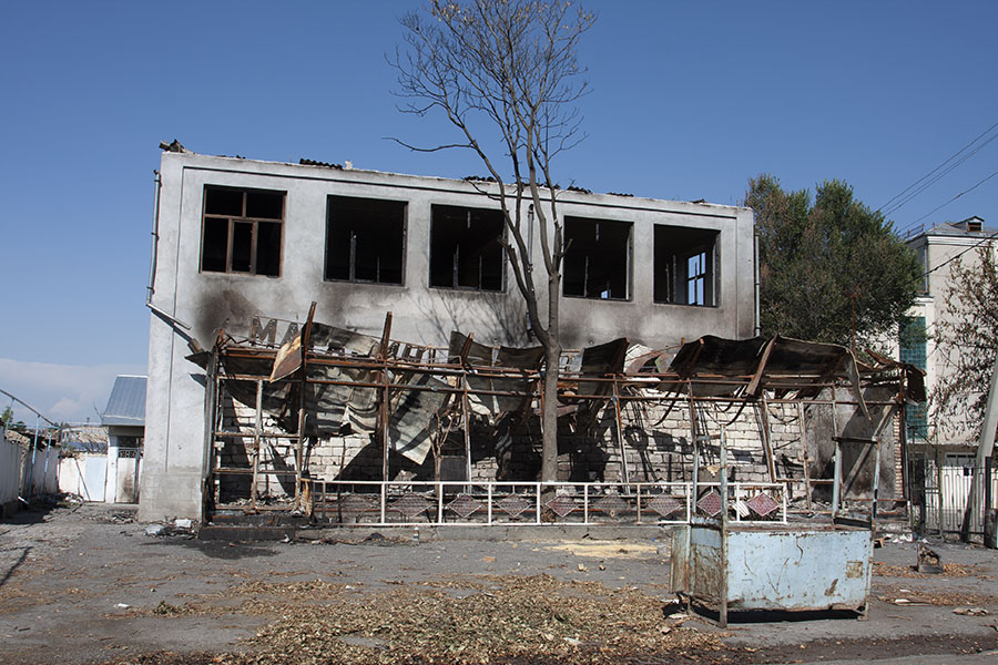 Damaged building after the civil unrest in Osh