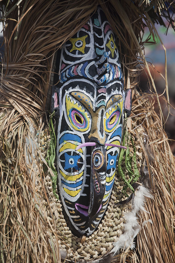Masked dancer of the Kambaramba group at the festival of Madang